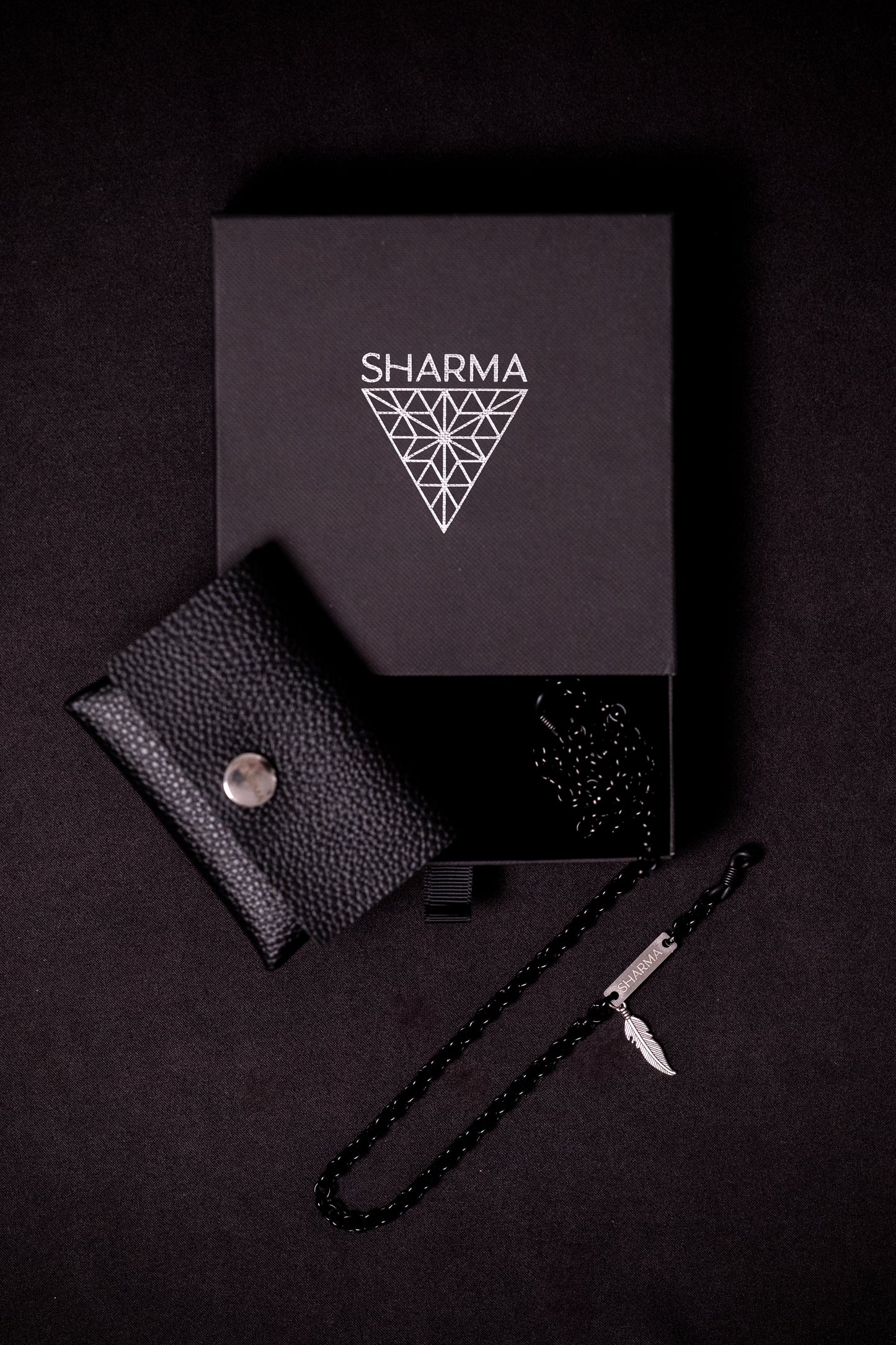 SHARMA Anita eyeglass chain — black, packaging