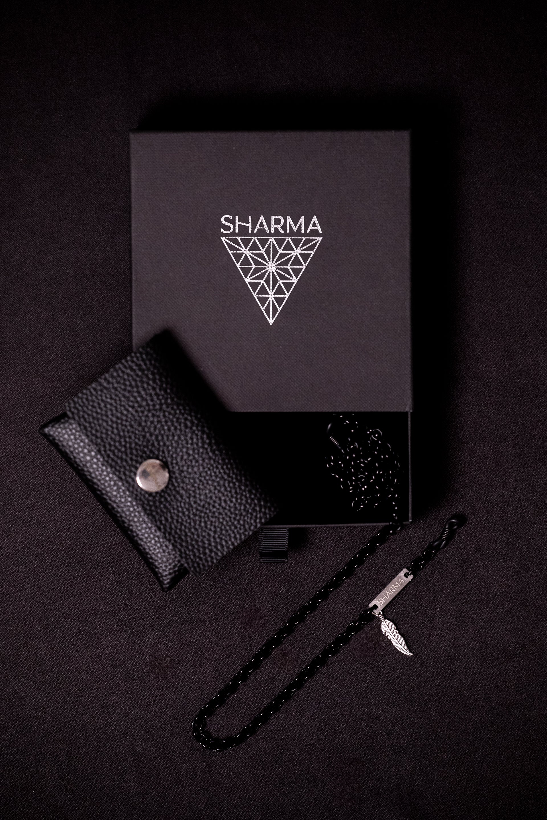 SHARMA Anita eyeglass chain — black, packaging