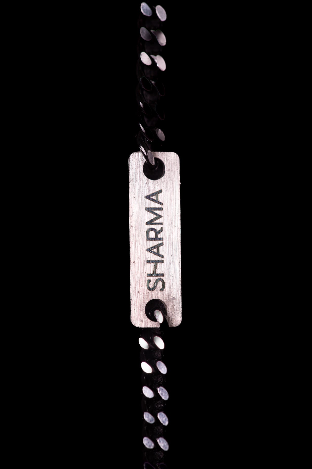 SHARMA Gaia face chain — black, macro detail