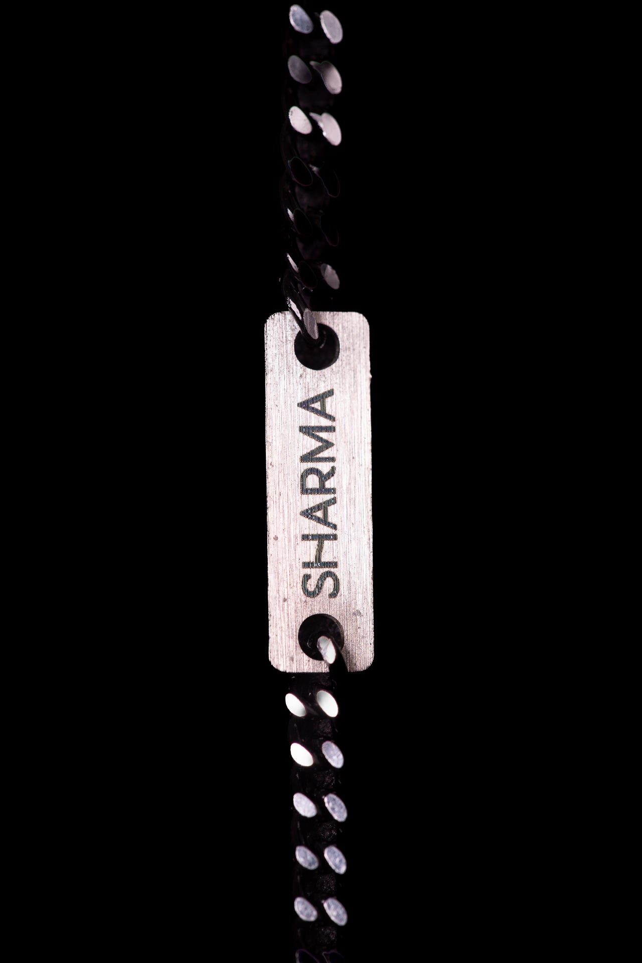 SHARMA Gaia face chain — black, macro detail