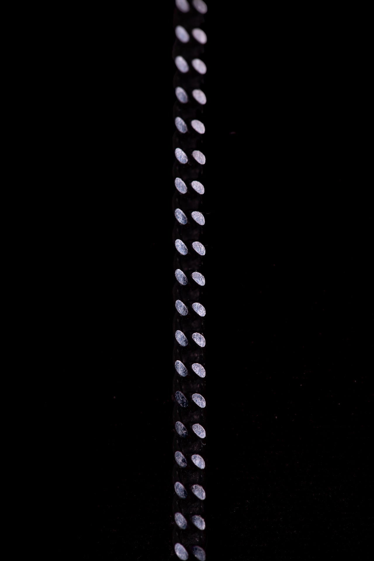 SHARMA Gaia face chain — black, macro detail