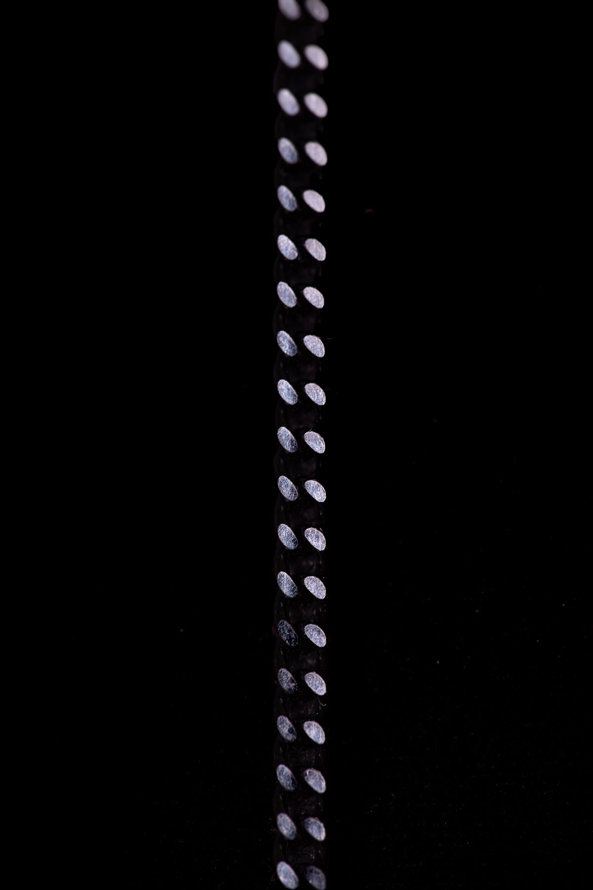 SHARMA Gaia face chain — black, macro detail