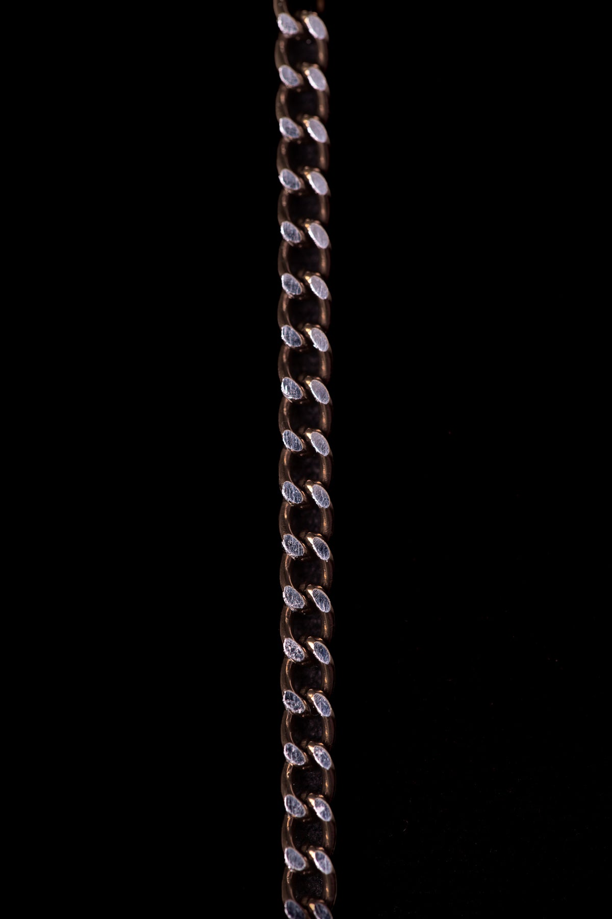 SHARMA Gaia face chain — bronze, macro detail
