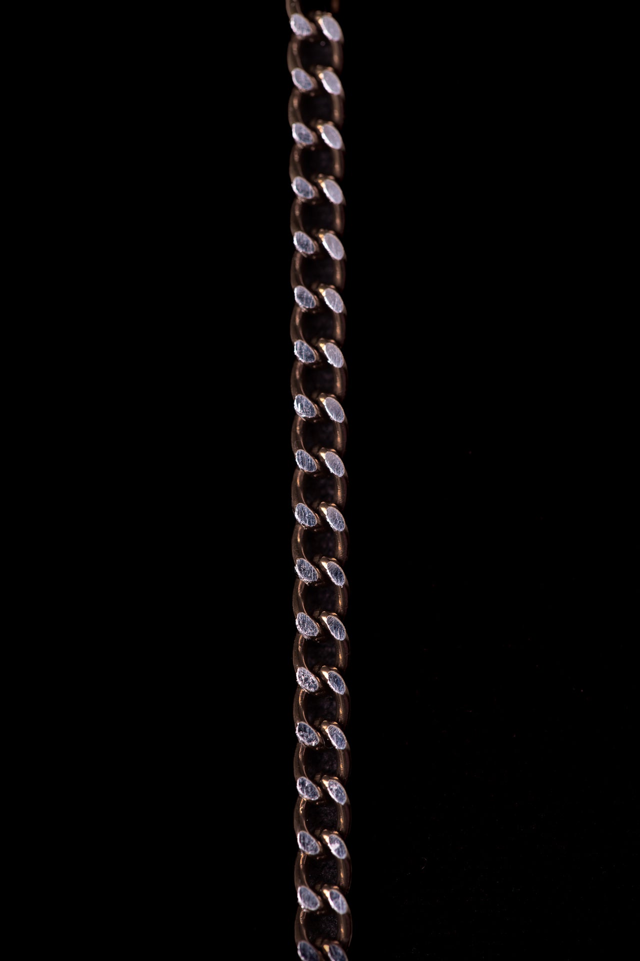 SHARMA Gaia face chain — bronze, macro detail