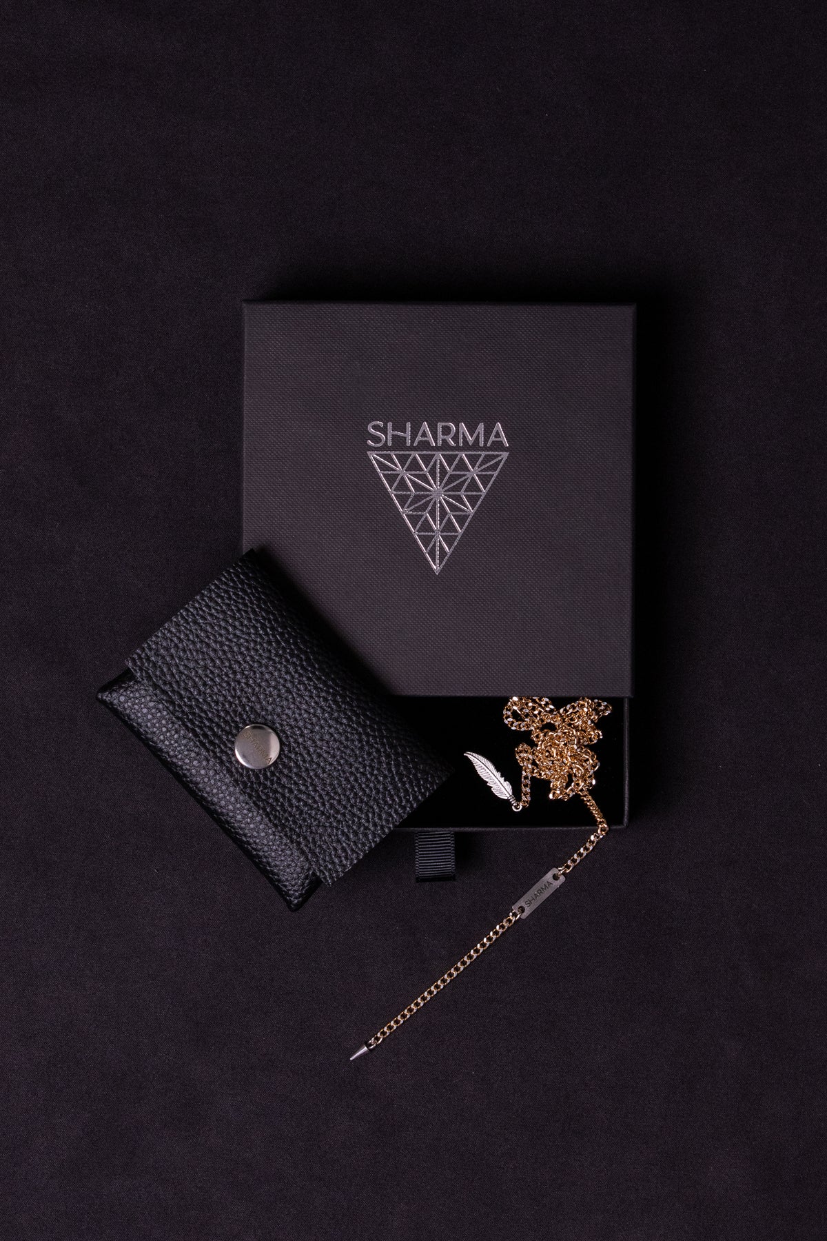 SHARMA Gaia face chain — gold, packaging