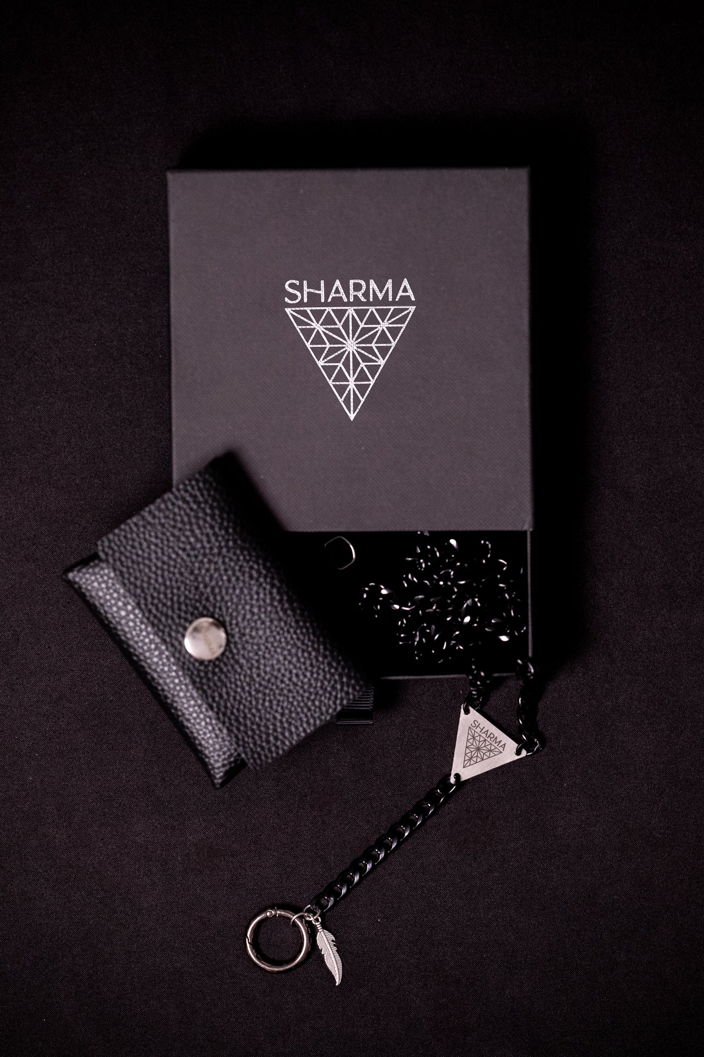 SHARMA Penelope phone chain — black, packaging