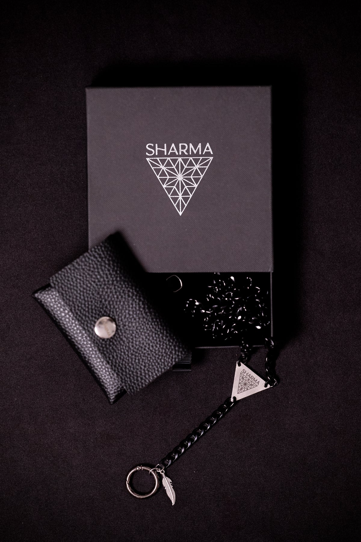 SHARMA Penelope phone chain — black, packaging